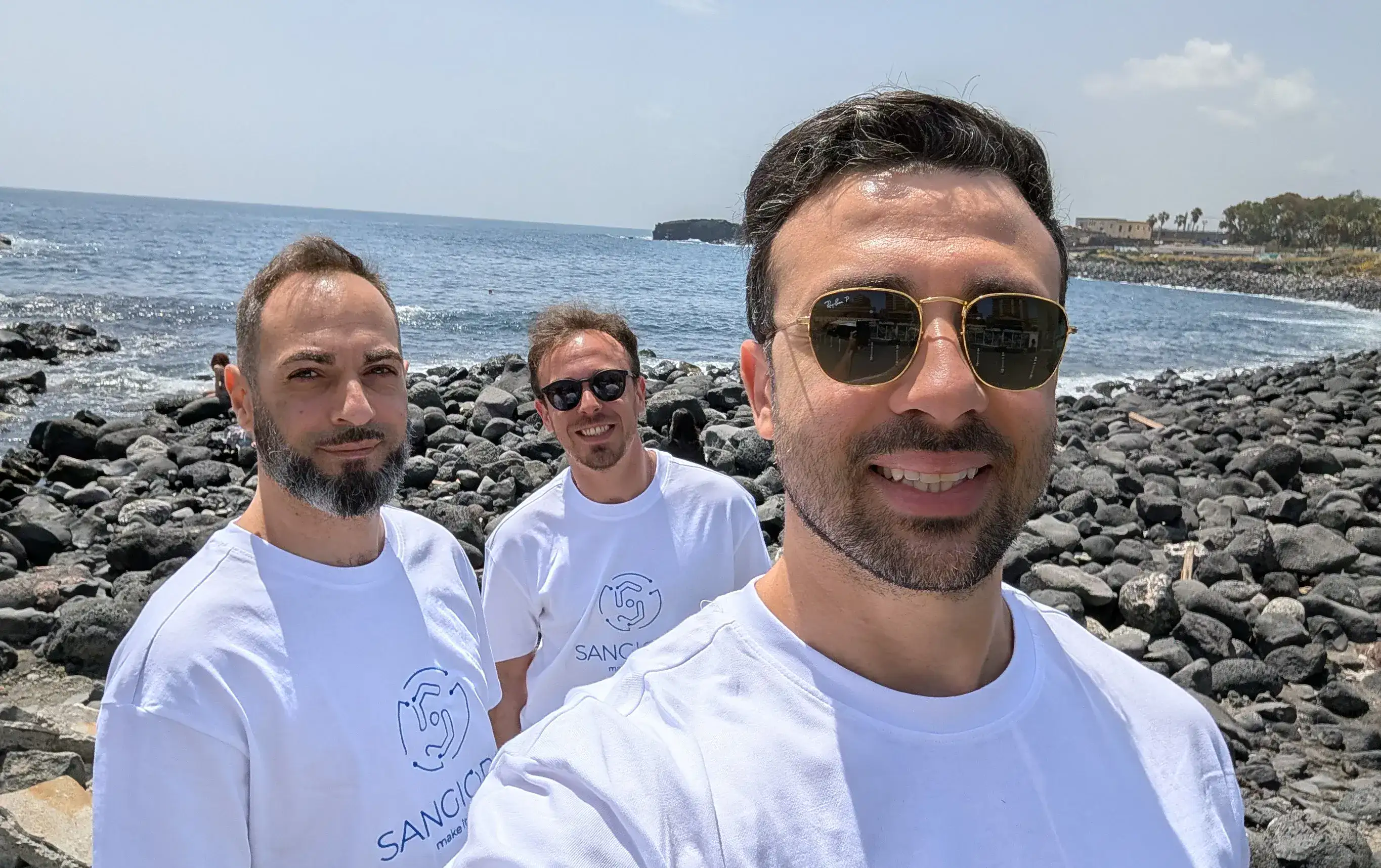 Alessandro Sangiorgi and members of the Sangiorgi SRL team hanging out along the Sicilian coastline